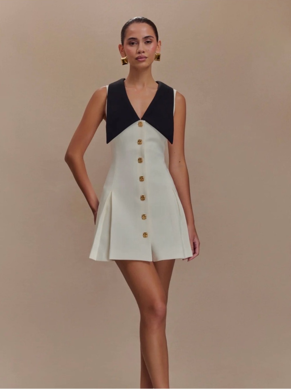 Meshki Oli dress size Large - Sleeveless Cream Mini Dress with Black V-Collar